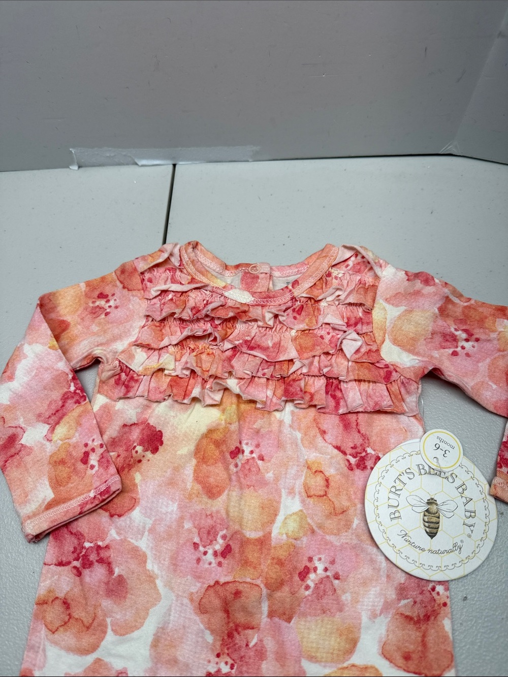 Burt’s Bees Floral Ruffle Long-Sleeve One-Piece Bodysuit in Pink. NWT - Picture 2 of 6